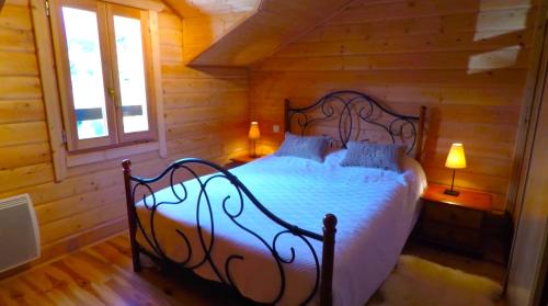 Ένα ή περισσότερα κρεβάτια σε δωμάτιο στο Chalet BeauBois