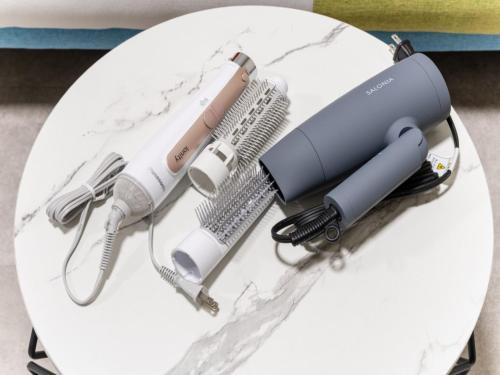 a table with a hair dryer and other items on it at Asakusa 4min walk, 8min to Senso-ji Temple, 5min to Ueno,4 min to Kappabashi, Switch, Free Wi-Fi, PocketWi-Fi in Tokyo