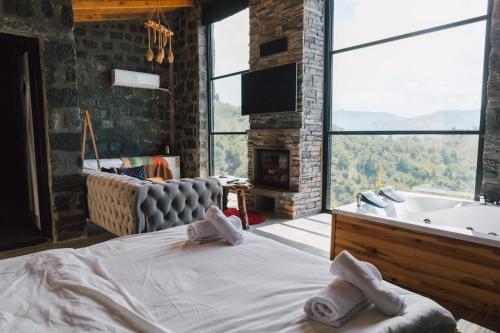 Ένα ή περισσότερα κρεβάτια σε δωμάτιο στο Madağ Bungalov