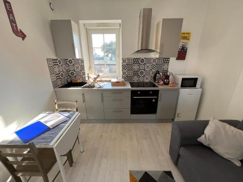 Kuchyň nebo kuchyňský kout v ubytování Beau Studio avec vue sur Mer et parking gratuit