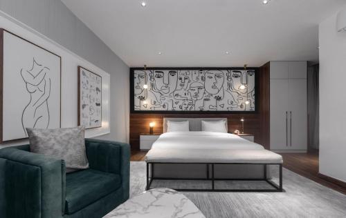 Postel nebo postele na pokoji v ubytování Ivy Lush Hotel