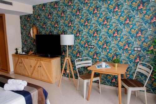 Μια τηλεόραση ή/και κέντρο ψυχαγωγίας στο Hotel Escuela San Cristobal