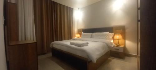 Ένα ή περισσότερα κρεβάτια σε δωμάτιο στο Mesca Chalet Soma Bay