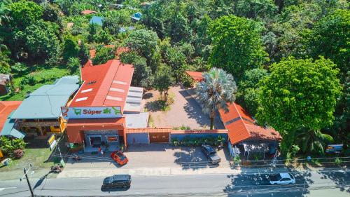 an overhead view of a church with a house at Casa Coki - Modern Villa Pool Steps From the Beach in Puerto Viejo