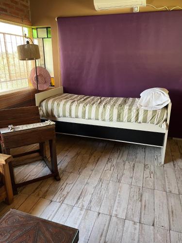 Ένα ή περισσότερα κρεβάτια σε δωμάτιο στο Casa Quinta Toay Tierrapampa