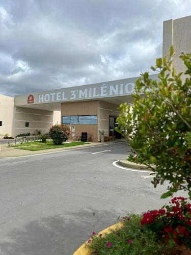 a hotel building with a sign on the front of it at Hotel Terceiro Milênio II in Brumado