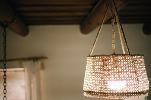 a light fixture hanging from a ceiling at Buna Guest House in Gyumri
