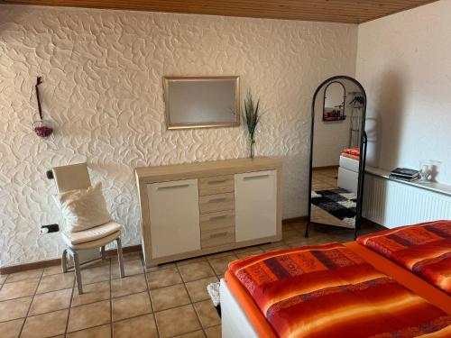 Postel nebo postele na pokoji v ubytování Ferienwohnung Höhenweg 25
