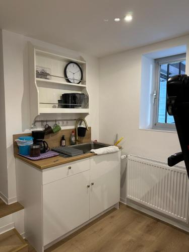 Η κουζίνα ή μικρή κουζίνα στο Catty Apartment