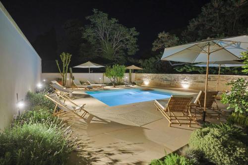Πισίνα στο ή κοντά στο DON GEROLAMO Dimora Storica con piscina