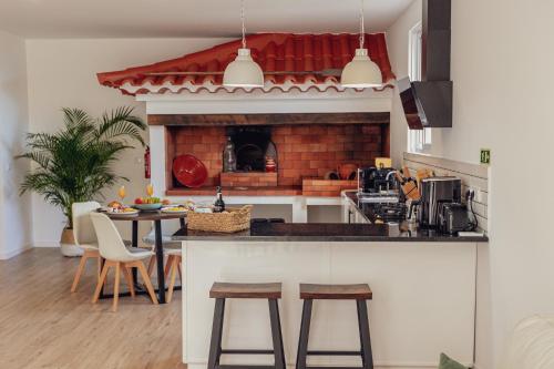 Kuchyň nebo kuchyňský kout v ubytování A Casa Da Mãe