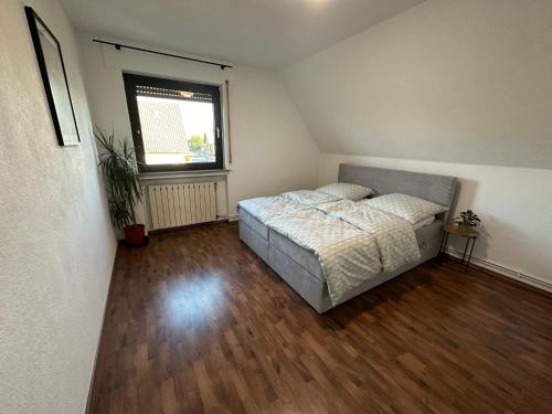 Postel nebo postele na pokoji v ubytování Haddenhausen Apartment