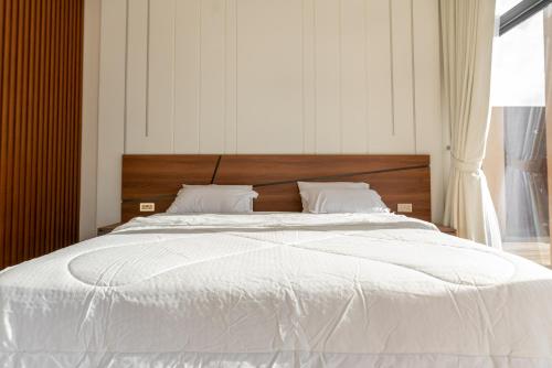 The MountainJewel Villa فيلا جوهرة الجبلにあるベッド