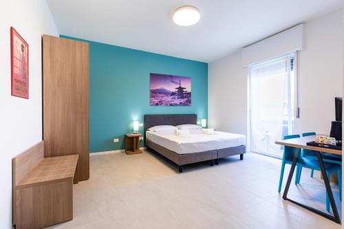 Postel nebo postele na pokoji v ubytování Residence Signoria degli Scaligeri