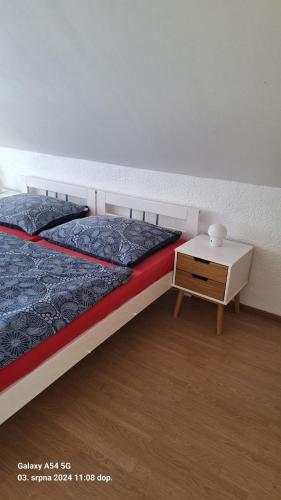 Postel nebo postele na pokoji v ubytování Pension Egida