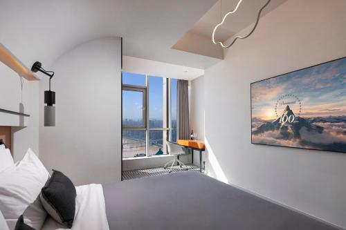 ISEYA Panoramic Hotel - Chongqing Jiefangbei Yunduan Zhiyanにあるベッド