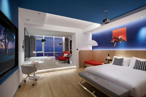 ISEYA Panoramic Hotel - Chongqing Jiefangbei Yunduan Zhiyanにあるベッド