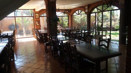 En restaurant eller et andet spisested på Campamento Hermoso Natural en Puebla