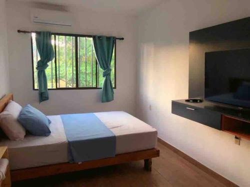 Giường trong phòng chung tại Apartment Casa Melodia