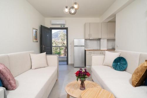 Η κουζίνα ή μικρή κουζίνα στο Mellies Suites