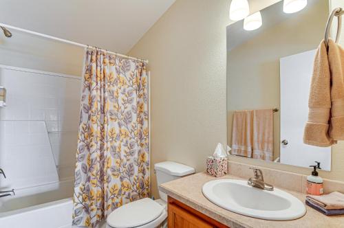 a bathroom with a sink and a toilet and a shower at Ranch House in Boulder! Gateway to Nearby Parks! in Boulder Town