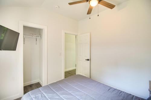 Una cama o camas en una habitación de Close to Lake Grove Cabin with Shared Fire Pit!