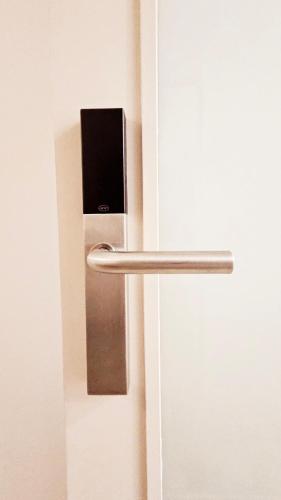 a close up of a door with a metal handle at Rooms4you 1 in historic center of Braga in Braga