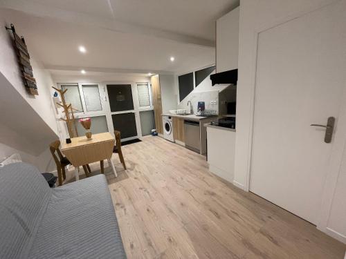 Kuchyň nebo kuchyňský kout v ubytování Appartement avec terrasse et ciel étoilé !