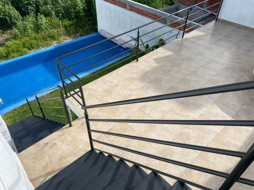 Bazén v ubytování Casa con vista al lago de Tequesquitengo nebo v jeho okolí