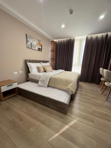 Postel nebo postele na pokoji v ubytování RoRa Studio Apartments