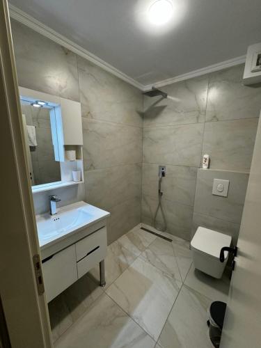 Koupelna v ubytování RoRa Studio Apartments