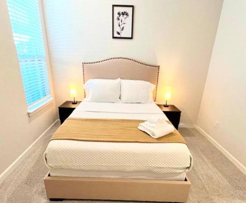 Ein Bett oder Betten in einem Zimmer der Unterkunft A Tranquil Haven for the Family