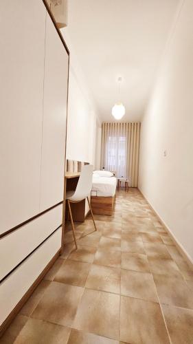 Ένα ή περισσότερα κρεβάτια σε δωμάτιο στο Rooms4you 2 in historic center of Braga