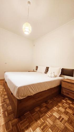 Ένα ή περισσότερα κρεβάτια σε δωμάτιο στο Rooms4you 2 in historic center of Braga