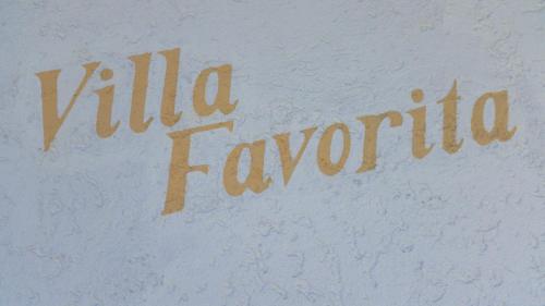 a sign that says virilla faganato on a wall at Villa Favorita - Parkhotel Delta in Ascona