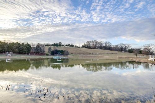a large pond with a bunch of birds in the water at Luxury Barndo 2AN Europe Style Farm Stay Chickens in Jefferson City