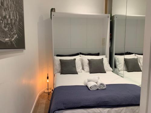 a bedroom with a bed with two towels on it at Fantastic Views at Luxury Prima Pearl Tower in Melbourne