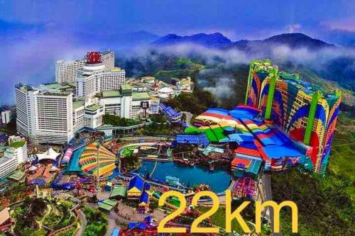 an aerial view of a carnival in a city at Free & Easy Leisure Homestay in Batu Caves