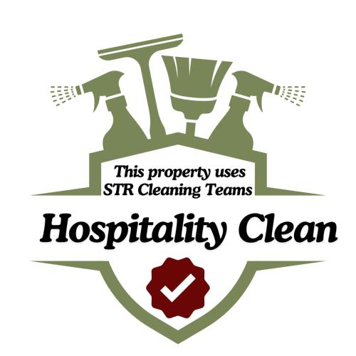 this property uses st cleaning teams hospitality clan logo at The Romantic Pink English Cottage at Tamborine Mountain in Mount Tamborine