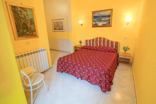 Katil atau katil-katil dalam bilik di Bed In Roma