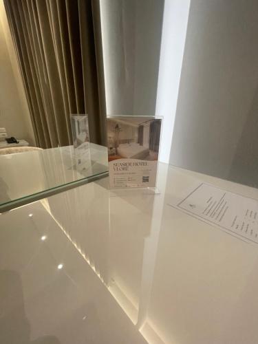a glass table with a box on top of it at Seaside Hotel in Vlorë