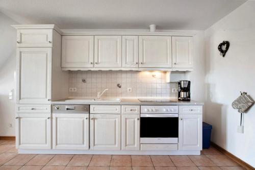 Η κουζίνα ή μικρή κουζίνα στο Ferienwohnung Ingwersen Nordstrand
