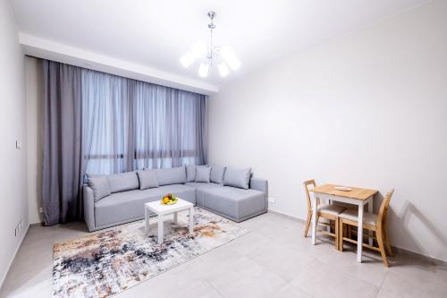 Posezení v ubytování VESTA - El Sheikh Zayed Residence