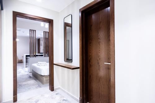 Postel nebo postele na pokoji v ubytování VESTA - El Sheikh Zayed Residence