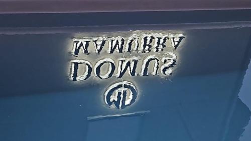 a sign that says midnight dome on a blue car at Domus Mamurra in Formia