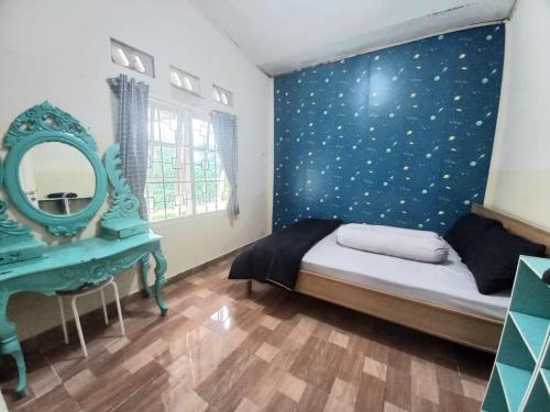 Ένα ή περισσότερα κρεβάτια σε δωμάτιο στο Jeff Guesthouse