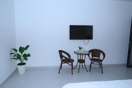 TV a/nebo společenská místnost v ubytování Maria Hotel