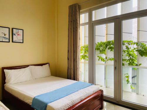 Postel nebo postele na pokoji v ubytování Alley 7 Homestay