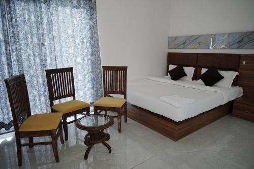 Katil atau katil-katil dalam bilik di Hotel Parmanand Garden