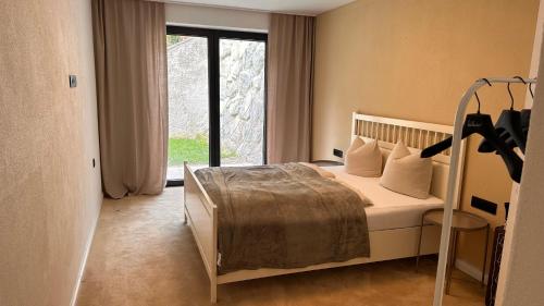 Posteľ alebo postele v izbe v ubytovaní Lou Garden Suite